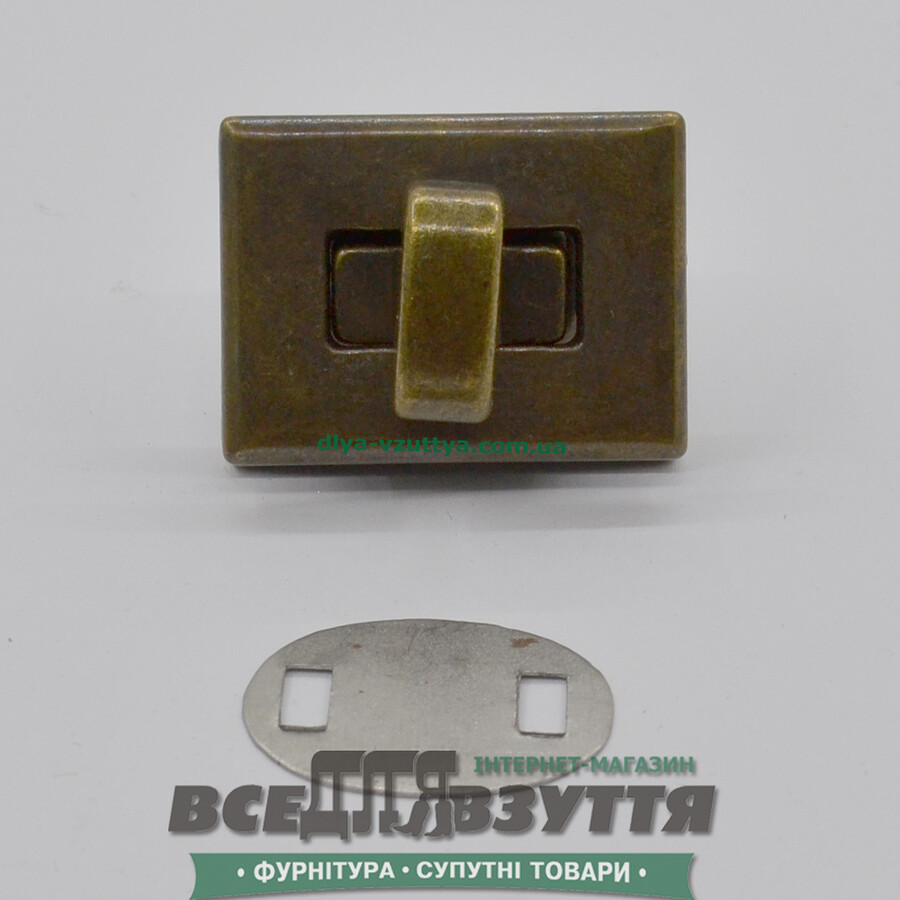 Замок на сумку поворотный 30*23мм цв. Антик